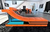 Sofa Dreams Wohnlandschaft Turino U Form Ledersofa - mit LED Beleuchtung, verstellbare Kopfstützen, Recamiere/Lederfarben wählbar/Ausrichtung wählbar (Ottomane Links, Schwarz-Orange)
